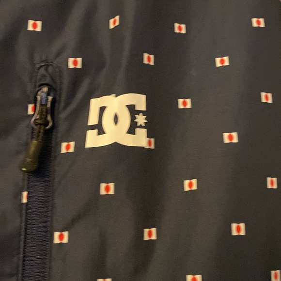 Men’s DC brand light nylon jacket. Navy blue with red and white design. - Picture 2 of 4